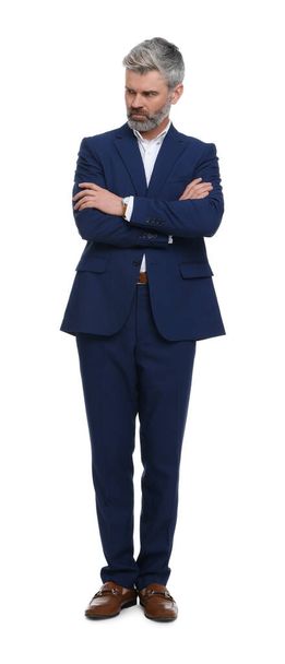 Mature businessman in stylish clothes posing on white background - Foto, imagen