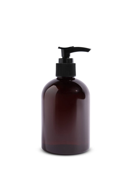 Bottle of cosmetic product with pump dispenser on white background - Valokuva, kuva