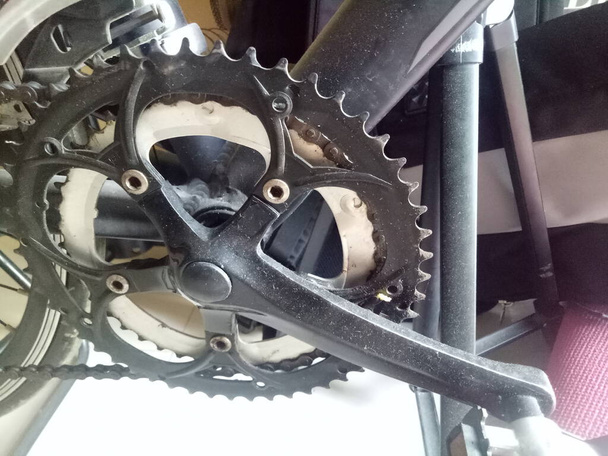 A photo of a bicycle crankset in black color - Photo, Image