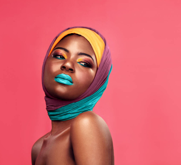 Makeup, fashion and scarf with black woman in studio for creative, art and culture. Beauty, cosmetics and natural with face of model isolated on pink background for african and color mockup. - Fotó, kép