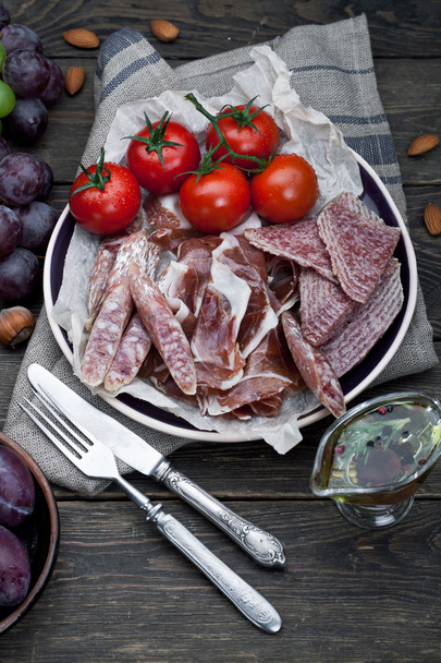 Ham with tomatoes and fruits - Photo, image