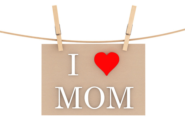 J'aime maman avec le coeur suspendu avec des pinces à linge
  - Photo, image