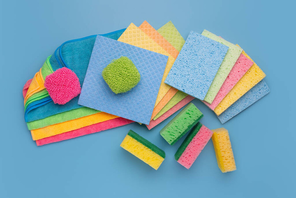 Various items for cleaning. Microfiber cloths, washcloths, scrapers, sponges - Valokuva, kuva