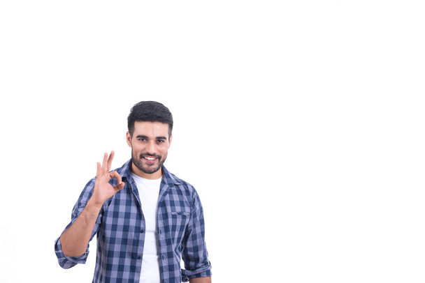Handsome smiling businessman showing ok sign with fingers,Say yes concept - Fotó, kép