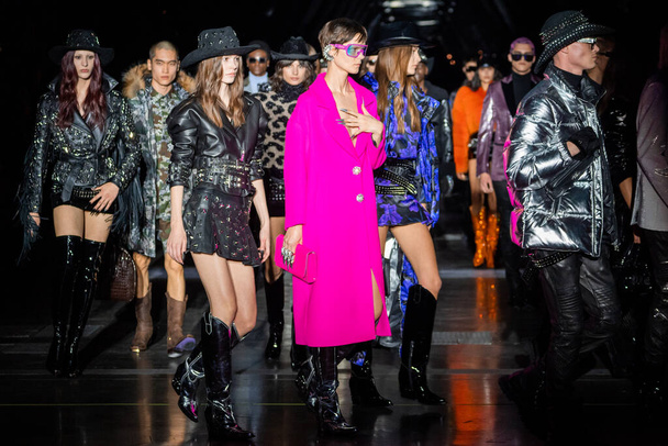MILAN, ITALY - FEBRUARY 25: Models walk the runway finale at the Philipp Plein fashion show during the Milan Fashion Week Womenswear Fall/Winter 2023/2024 on February 25, 2023 in Milan, Italy. - Photo, Image