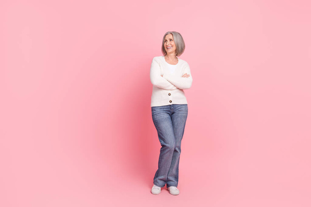 Full size photo of cheerful satisfied person folded hands look empty space advert isolated on pink color background. - Foto, Bild