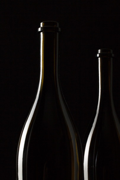 Silhouettes of elegant wine bottles - Fotografie, Obrázek