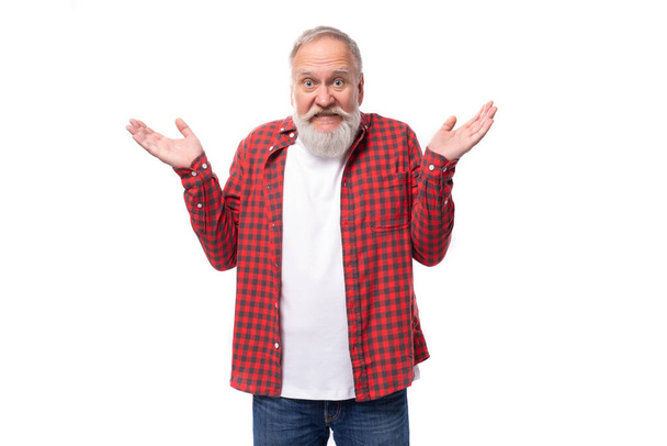 handsome 60s retired man with white beard and mustache throws up his hands. - Photo, Image