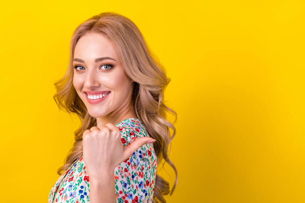 Closeup photo of young blonde hair lady trendy flowers print blouse point finger novelty fashion week isolated on yellow color background. - Фото, зображення