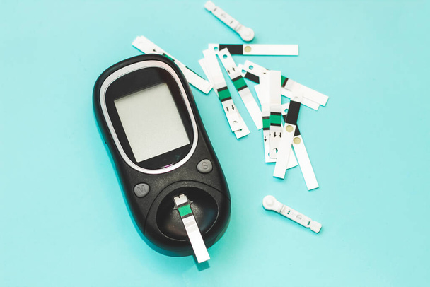 A gadget for measuring blood sugar for diabetics. - Foto, Bild