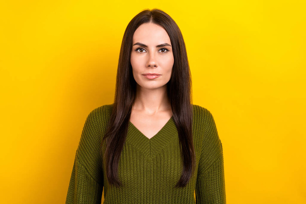 Photo of focused concentrated girl calm face wear knit jumper isolated on yellow color background. - Fotó, kép