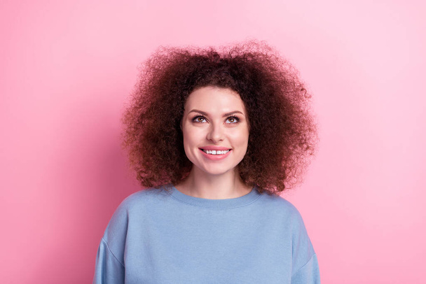 Closeup photo of pretty cute girl wear blue sweatshirt cheerful looking up mockup new brand cosmetology isolated on pink color background. - Foto, imagen