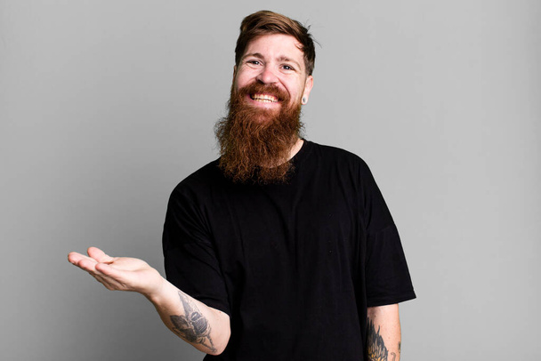 long beard and red hair man smiling cheerfully, feeling happy and showing a concept - Fotografie, Obrázek