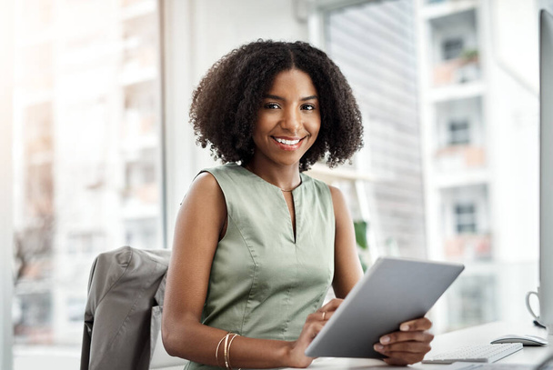 Tablet, portrait and business woman in office of online management, research and happy with technology solution. Paperless, typing and face of young African person on digital application for analysis. - Fotoğraf, Görsel