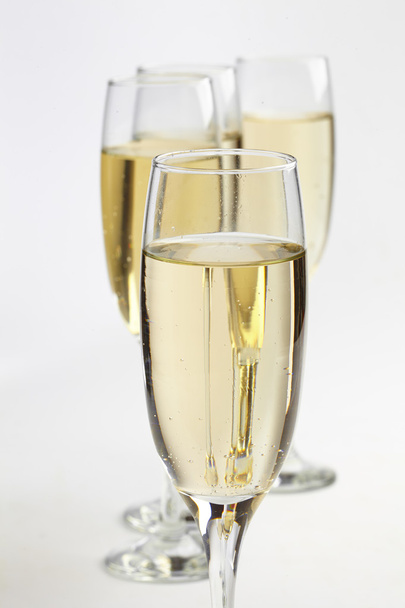 Champagne glasses on white - Fotoğraf, Görsel