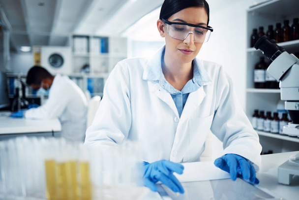 Science, research and woman on tablet in laboratory for medical analysis, internet or online report. Healthcare, biotechnology and female scientist on digital tech for medicine, study or test results. - Photo, Image