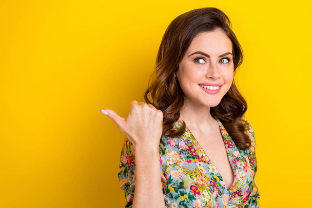 Portrait of lady promoter pointing finger empty space offer discounts adverts isolated on shine color background. - Фото, зображення
