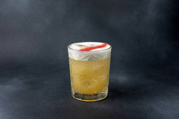 Delicious alcoholic cocktail on a dark background - Valokuva, kuva