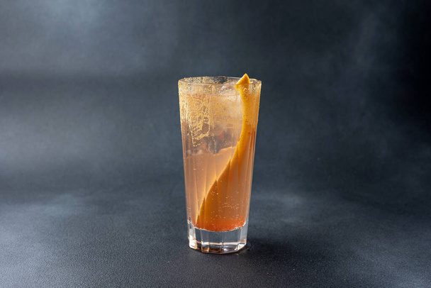 Delicious alcoholic cocktail on a dark background - Фото, зображення