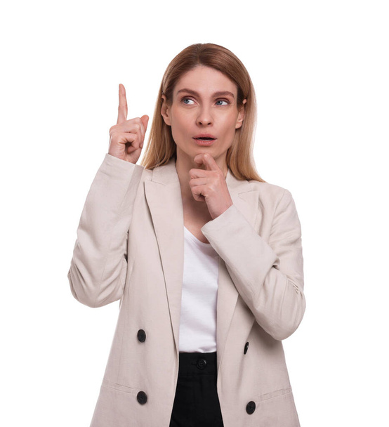 Beautiful business woman pointing on white background - Foto, afbeelding