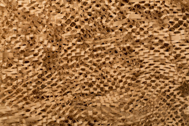 Környezetbarát méhsejt kézműves papír mint háttér, felülnézet. - Fotó, kép