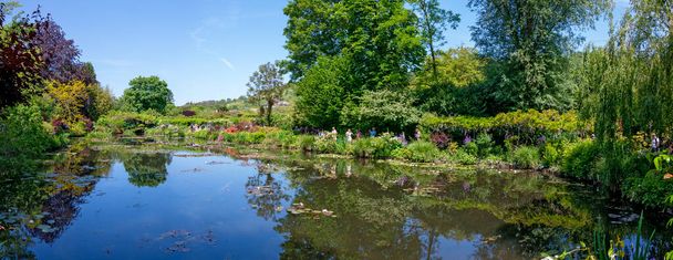 panoramic view of the water lily pond in the former garden of the artist Claude Monet in the village of Giverny, France - 写真・画像