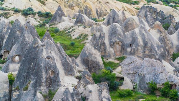 Fairy chimneys in Cappadocia Turkey. Cappadocia landscape. Travel to Turkey. Selective focus included. - Foto, imagen