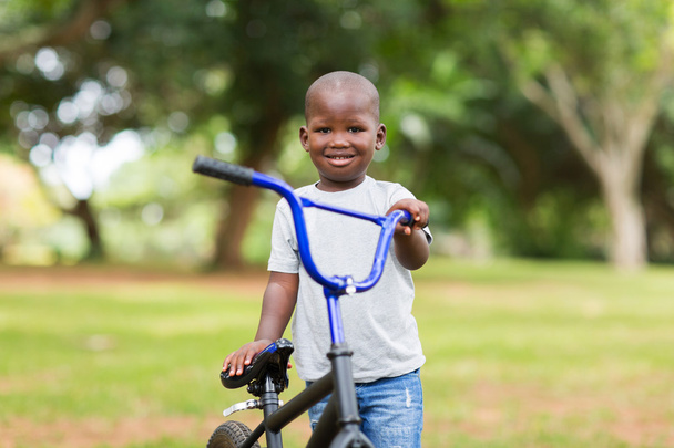 Boy with his bike outdoors - Foto, Imagen