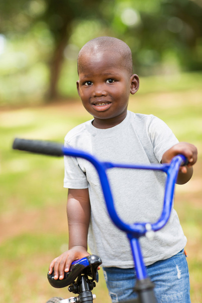 Boy with his bike outdoors - Φωτογραφία, εικόνα