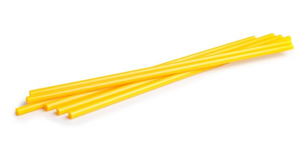 Yellow plastic straws on white background - Photo, image