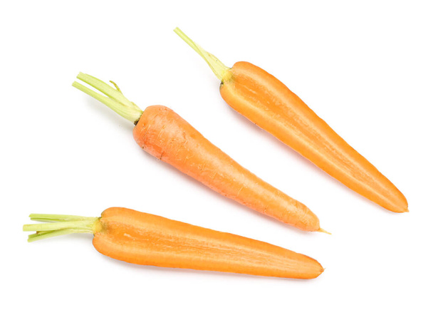 Fresh carrot and slices on white background - Foto, Imagem