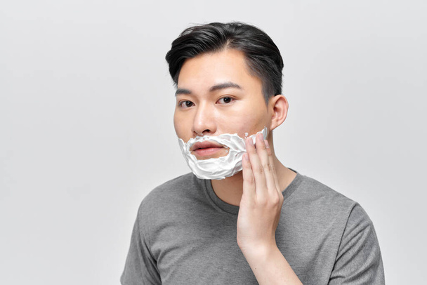 Shaving cream on face, hair and skincare for happy male model grooming - Foto, imagen