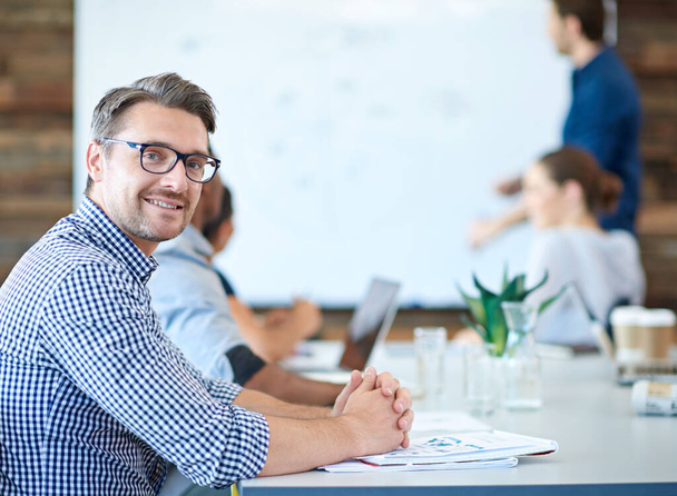 Project meeting, employee portrait and happy man listen CEO presentation, sales pitch or investment ideas. Collaboration, strategy and office businessman, client or team work on group financial plan. - 写真・画像
