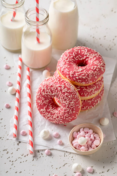 Homemade and yummy donuts for Fat Thursday. Served with milk. Most popular dessert. - 写真・画像