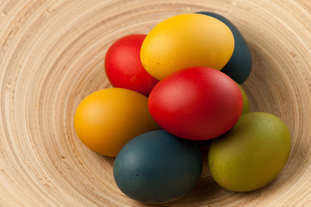 Colorful easter eggs decorated on color background - 写真・画像