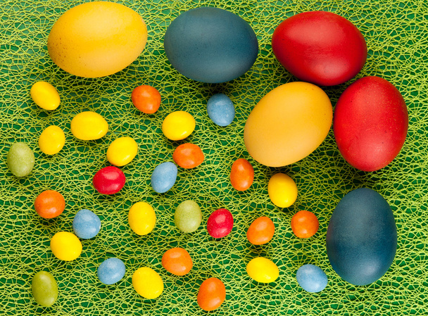 Colorful easter eggs decorated on color background - Foto, Imagem
