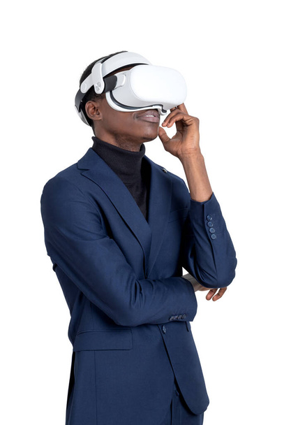 Black businessman smiling portrait, working in vr glasses headset, arms crossed isolated over white background. Concept of digital world and metaverse - Photo, Image