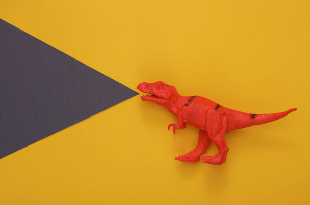 Creative layout with tyrannosaurus rex toy - Foto, afbeelding