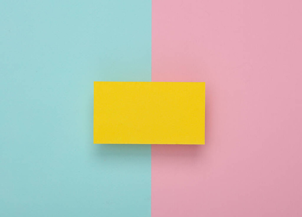 Yelow Blank business card for corporate identity on pink blue background. Creative mockup. - Фото, изображение