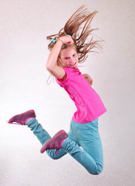 pretty girl  jumping high - Фото, изображение
