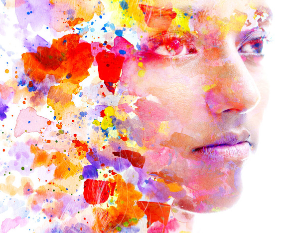 A closeup of a colorful paintography portrait of a young beautiful woman - Foto, imagen
