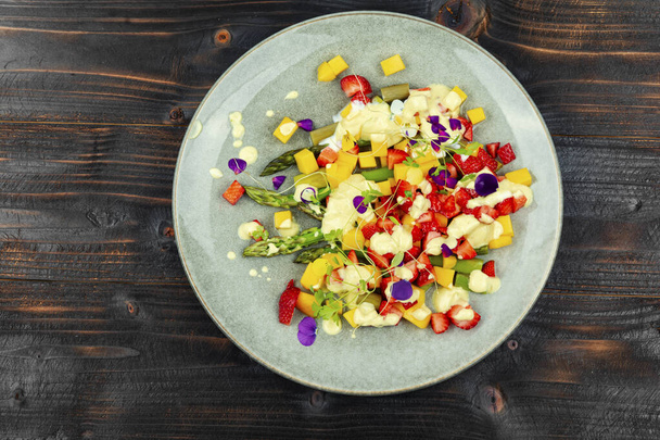 Summer fresh salad with spice, strawberries, yogurt and mango. Top view - Valokuva, kuva