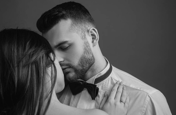 Close-up of beautiful passionate sexy couple kissing. Young girlfriend and boyfriend - 写真・画像