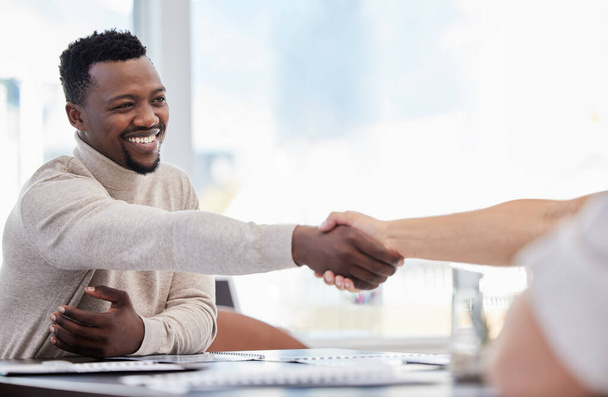 Black man, handshake and partnership, success in interview with onboarding, promotion and working together. Collaboration, professional team and business people shaking hands in office with hiring. - Photo, Image