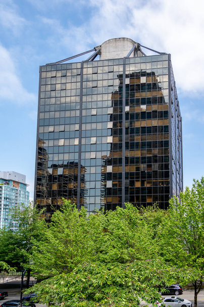 Vancouver, British Columbia - May 27, 2023: Views of the landmark Qube building in Vancouver's downtown. - Photo, Image