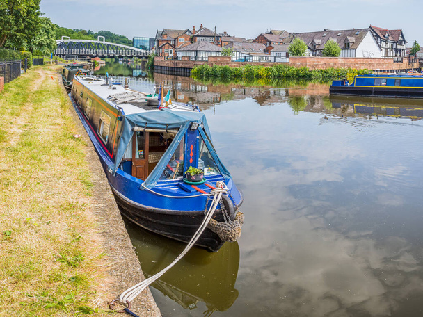 Colourful narrow boats captured in Northwich Quay on the River Weaver in June 2023 under a bright sky. - Photo, Image