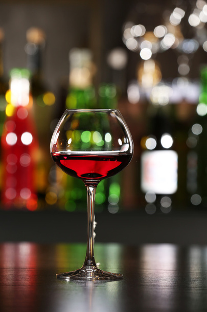 Glass of wine with bar - Zdjęcie, obraz