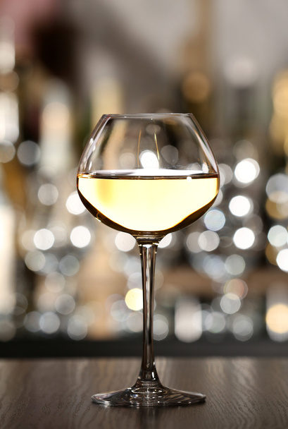 Glass of wine with bar - Photo, image