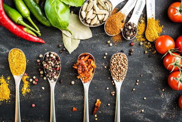 spoons with spices - 写真・画像