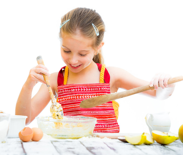 little girl making dough - Фото, изображение